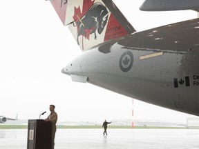 CPL. ROD DOUCET/8 Wing Imaging
Lieutenant-Colonel Bill Church, Commanding Officer from 429 Squadron, gives the opening remarks for the tail design reveal at 1 Hangar, 8 Wing Canadian Forces Base Trenton.