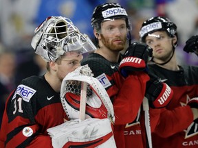 Canada's goalie Calvin Pickard reacts after defeat in the World Hockey Championships final between Canada and Sweden in the LANXESS arena in Cologne, Germany, Sunday, May 21, 2017. (