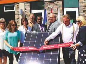 Pictured (l. to r. ) Maryann Thompson, Kara Westerlund, Rita Moir, Mark Gressler, Winston Rossouw, MP Jim Eglinski, Reeve Bart Guyon, Shirley Mahan and MLA for Wetaskiwin-Camrose, Bruce Hinkley at the Solar Project unveiling ceremony held May 23.