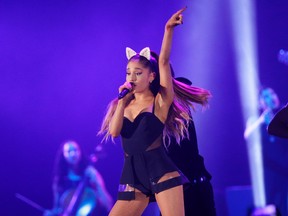 In this Aug. 26, 2015 file photo, Ariana Grande performs during the honeymoon tour concert in Jakarta, Indonesia.  (AP Photo/Achmad Ibrahim, File)