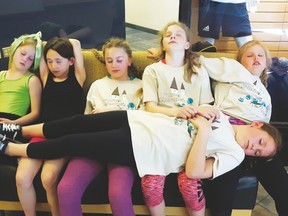 Brazeau Gymnastics Club participants enjoy a short nap after the competition is over.