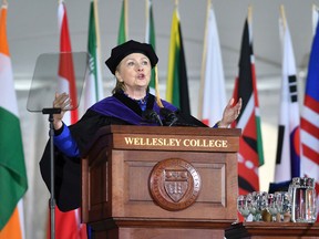 Former Secretary of State Hillary Clinton gestures after she delivered the commencement address at Wellesley College, Friday, May 26, 2017, in Wellesley, Mass. Clinton graduated from the school in 1969. (AP Photo/Josh Reynolds)