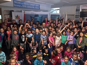 Children cheer at MP Marc Serre's press conference to announce $100,000 to upgrade the Noelville Community Recreation Centre through the Canada 150 Community Infrastructure Program, Friday, May 26, 2017. Photo supplied