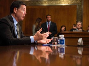 (FILES) This file photo taken on May 3, 2017 shows FBI Director James Comey as he testifies before the Senate Judiciary Committee on Capitol Hill in Washington, DC.
US President Donald Trump on May 9, 2017 made the shock decision to fire his FBI director James Comey, the man who leads the agency charged with investigating his campaign's ties with Russia."The president has accepted the recommendation of the Attorney General and the deputy Attorney General regarding the dismissal of the director of the Federal Bureau of Investigation," White House spokesman Sean Spicer told reporters.
JIM WATSON/Getty Images