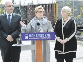 Ontario Premier Kathleen Wynne makes an announcement about high-speed rail with Transportation Minister Steven Del Duca and London North Centre MPP Deb Matthews on May 19. (London Free Press file photo)