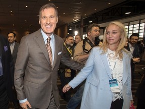 Maxime Bernier arrives at the federal conservative leadership convention with his girlfriend Catherine LeTarte in Toronto on May 26, 2017. (THE CANADIAN PRESS/Fred Thornhill)