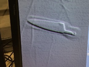 This is a photo of a vertical computer screen displaying a photo of a blade discovered under a mattress at the Elgin-Middlesex Detention Centre in London. (Supplied)