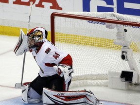 Senators goalie Craig Anderson gives up the game-winning goal during the second overtime period against the Penguins of Game 7. (AP Photo/Gene J. Puskar)