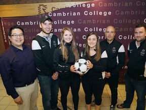 Tim Yu, left, manager of athletics at Cambrian College, coach Evan Phillips, soccer players Clarissa McArthur and Marissa Falvo, Giuseppe Politi, head coach of Cambrian College's women's soccer team, and coach Steph Legrand were on hand for a press conference at the college in Sudbury, Ont. on Friday May 26, 2017. Cambrian will host the OCAA Provincial Women's Soccer Championships on Oct. 26-28, 2017. John Lappa/Sudbury Star/Postmedia Network