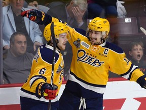 Erie Otters’ Dylan Strome (right) celebrates his goal against the Saint John Sea Dogs with teammate Jordan Sambrook during Memorial Cup semifinal action in Windsor on Friday, May 26, 2017. (THE CANADIAN PRESS/Adrian Wyld)