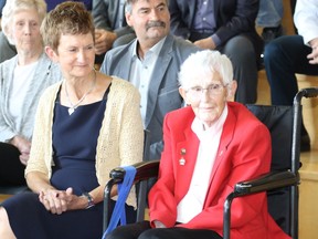 Sharon Trenaman, left, and Betty Carveth-Dunn take part in the induction ceremony at the Alberta Sports Hall of Fame in Red Deer on Friday, May 27, 2017.