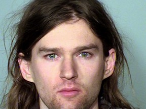 This undated file photo provided by the Ramsey County Sheriff's Office in St. Paul, Minn., shows Linwood Kaine. U.S. Sen. Tim Kaine's youngest son was among eight people charged for allegedly disrupting a March 2017 rally in support of President Donald Trump. Linwood "Woody" Kaine, of Minneapolis, was charged Friday, May 26, 2017, with one gross misdemeanor count of obstructing the legal process and misdemeanor counts of fleeing on foot and concealing his identity in public. (Ramsey County Sheriff's Office via AP, File)