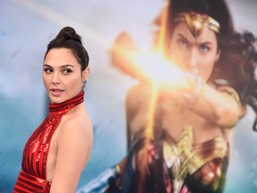 In this May 25, 2017 file photo, Gal Gadot arrives at the world premiere of "Wonder Woman" in Los Angeles. Scattered plans among Alamo Drafthouse Cinemas to host women-only screenings of the upcoming "Wonder Woman" movie have produced both support and some grumbling about gender discrimination. The movie opens June 2 based on the DC Comics character. (Photo by Jordan Strauss/Invision/AP, File)