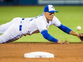 Jays shortstop Ryan Goins was impressive defensively against Texas on Saturday. (The Canadian Press)