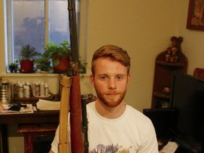 Matthew Prince, 25, recently found a Stevens Savage 87B .22 calibre rifle stashed in an old dresser that someone tossed out with a pile of garbage at the side of a road in the city's west end. (CHRIS DOUCETTE, Toronto Sun)