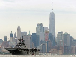 The USS Kearsarge moves past lower Manhattan as part of New York's Fleet Week as seen from Weehawken, N.J., Wednesday, May 24, 2017. New York's Fleet Week kicked off with a parade of ships up the Hudson River. The public will have a chance to interact with service members and see military demonstrations through Tuesday, May 30 when the ships leave the New York area. (AP Photo/Seth Wenig)