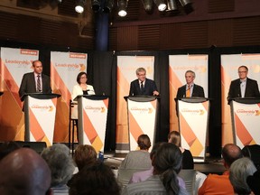 Candidates Jagmeet Singh, Guy Caron, Niki Ashton, Charlie Angus, Pat Stogran and Peter Julian listen to questions at the federal NDP leadership race debate in Sudbury, Ont. on Sunday May 28, 2017. (Gino Donato/Postmedia Network)