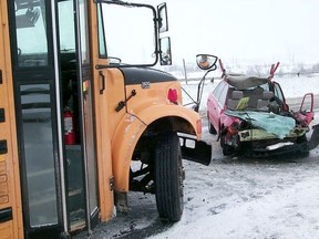 Regional Road 35 west of Sudbury was closed for several hours on Nov. 22, 2000, after a head-on collision between a 1990 Mazda and a school bus. (John Lappa/Sudbury Star file photo)