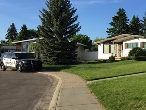 An Edmonton Police Service vehicle and police tape remain at the scene of a suspicious death of a six-month-old boy in the area of 142 Avenue and 77 Street on Sunday, May 29, 2017. An ambulance was called around 7 a.m. Sunday and a police news release Sunday said the death is being treated as suspicious.
An autopsy is scheduled for Monday morning. Catherine Griwkowsky/Postmedia