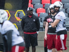 Redblacks defensive lineman Moton Hopkins watches practice from the sideline at TD Place after announcing his retirement. (Errol McGihon, Ottawa Sun)