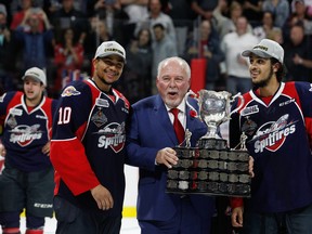 Forward Jeremiah Addison and defenceman Jalen Chatfield of the Windsor Spitfires celebrate winning the championship game of the Memorial Cup against the Erie Otters on May 28, 2017 at the WFCU Centre. (Dennis Pajot/Getty Images)
