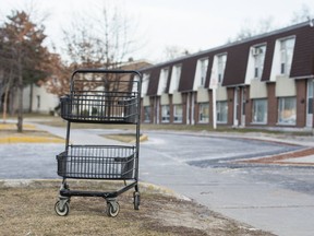 An abandoned grocery cart is pictured in front of TCHC units on Wakunda Place in Toronto on March 5, 2017. (ERNEST DOROSZUK, Toronto Sun)