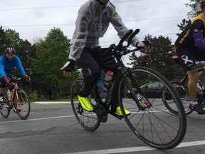 Cyclists with the 7 Days in May ride arrive in Kingston during their trip around Lake Ontario to raise money for pancreatic cancer research at the Canadian Cancer Trials Group (CCTG) at Queen’s University in Kingston on Monday. (Elliot Ferguson/The Whig-Standard)