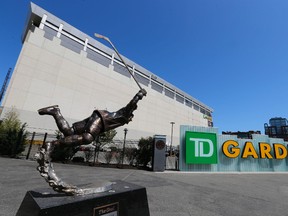 Boston's TD Garden arena with a statue of Bobby Orr's Stanley Cup-winning goal in 1970. (MICHAEL PEAKE/Toronto Sun)