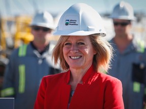 Alberta Premier Rachel Notley waits before making an announcement regarding work to speed the cleanup of Alberta’s old energy infrastructure near Carstairs, Alta., Thursday, May 18, 2017. THE CANADIAN PRESS/Jeff McIntosh