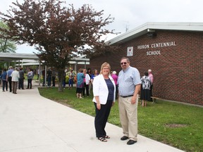 Principal Carol Rauser and Vice Principal Rob Holland in front of the school at its 50th anniversary open house on Saturday, May 27.                      (Justine Alkema/Clinton News Record)