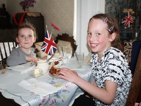 Scone enthusiasts Kiera (left) and Chelsea (right) said that they were quite happy with their servings during Moore Museum's May 21st Victorian Tea social.
CARL HNATYSHYN/SARNIA THIS WEEK