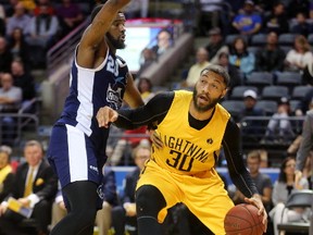 Royce White of the London Lightning works in on CJ Washington of the Halifax Hurricanes during the first half of their first championship playoff series game at Budweiser Gardens in London, Ont. on Friday May 26, 2017. (MIKE HENSEN, The London Free Press)