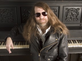 In this Oct. 20, 2006 file photo, Paul O'Neill, of Trans Siberian Orchestra, poses for a portrait in New York. O'Neill, who founded the progressive metal band Trans-Siberian Orchestra that was known for its spectacular holiday concerts filled with theatrics, lasers and pyrotechnics was found dead in his room at a Tampa Embassy Suites, Wednesday, May 24, 2017. He was 61. (AP Photo/Jim Cooper, File)