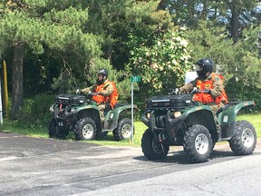 BRUCE BELL/THE INTELLIGENCER
Members of the Ontario Provincial Police Emergency Repsonse Team search along County Road 28 in Ameliasburgh for David Franks, a 24-year-old County resident who was last seen on Thursday morning.