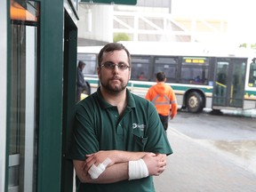 Sudbury Transit bus driver Steve Blondin stands at the downtown transit terminal in Sudbury, Ont. on Tuesday May 30, 2017.  Blondin was involved in a violent incident while driving his route Sunday evening. He received minor injuries resulting from the altercation when he was attacked. Gino Donato/Sudbury Star/Postmedia Network
