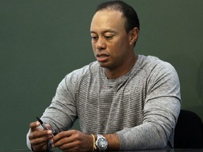 Tigers Woods' alleged miscue could cost him millions if his main sponsor, Nike, kicks him to the curb. He has a $25-million yearly deal with the sporting goods giant. (POSTMEDIA/FILES)