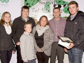 Meghan, Colton, Andrew, Tina and Mike Metske, present the Brandon Metske 4H Heart and Soul Award to Brad MacIntyre.