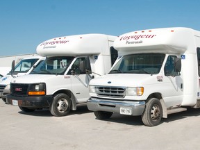 A pair of Voyageur paratransit vans sit in the Admiral Drive depot parking lot in London. (File photo)