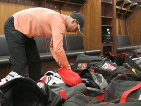 Ottawa Senators goaltender Craig Anderson organizes his equipment as the team cleans out its lockers at the Canadian Tire Centre on May 27, 2017. (Patrick Doyle/Postmedia)