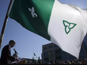 Ottawa mayor, Jim Watson, is photographed speaking during a ceremony outside City Hall to mark Franco-Ontarian Day in Ottawa, on September 25, 2014 (Darren Brown, Postmedia)