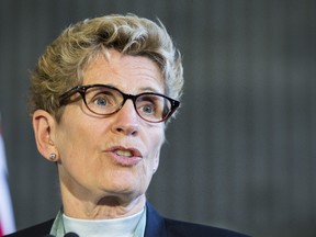 Premier Kathleen Wynne’s latest victims are small business owners, in particular, who create most of the jobs in our economy, on whom she’s imposing a staggering 22.8% hike in the minimum wage seven months from now. (TORONTO SUN/FILES)