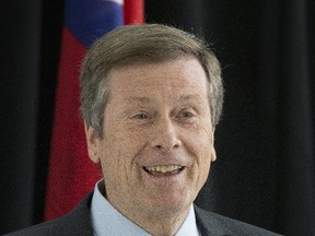 Mayor John Tory said the city has fast-tracked 32 of its 70 road construction projects by such measures as extending work hours. (TORONTO SUN/FILES)