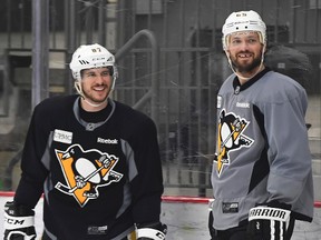 Pittsburgh Penguins Sidney Crosby, left, and Ron Hainsey smile during afternoon practice at the UPMC Lemieux Sports Complex on May 30, 2017 in Cranberry, Pa. (Peter Diana/Pittsburgh Post-Gazette via AP)