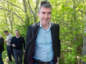 Nova Scotia Premier Stephen McNeil heads from a chat with reporters after voting in the provincial election at the community centre in Granville Centre, N.S. on Tuesday, May 30, 2017. THE CANADIAN PRESS/Andrew Vaughan