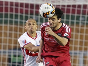 Jason Hernandez (left) and the rest of TFC are going to have to take Ottawa Fury a little more seriously if they want to pull out the victory at BMO Field tonight. (THE CANADIAN PRESS)