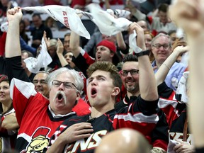 Fans celebrate in the first period as the Ottawa Senators take on the Pittsburgh Penguins in Game 3 of the Eastern Conference final at the Canadian Tire Centre on May 17, 2017. (Wayne Cuddington/Postmedia)