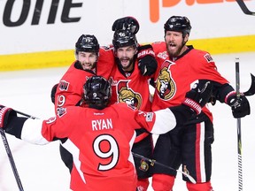 Ottawa Senators centre Derick Brassard, right winger Bobby Ryan, left winger Clarke MacArthur and defenceman Marc Methot celebrate a goal against the Pittsburgh Penguins during Game 3 on May 17, 2017. (THE CANADIAN PRESS/Sean Kilpatrick)