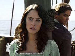 In this image released by Disney, Kaya Scodelario portrays Carina Smyth, left, and Brenton Thwaites portrays Henry Turner in a scene from "Pirates of the Caribbean: Dead Men Tell No Tales." (Disney via AP)