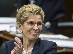 Ontario Premier Kathleen Wynne answers at Queen's Park in Toronto on May 11, 2017. (Craig Robertson/Toronto Sun)