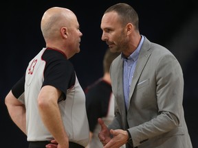 London Lightning head coach Kyle Julius questions a refs call during pause in play during the second half of NBL Championship series action against the Halifax Hurricanes. (Photo by Mike Dembeck)